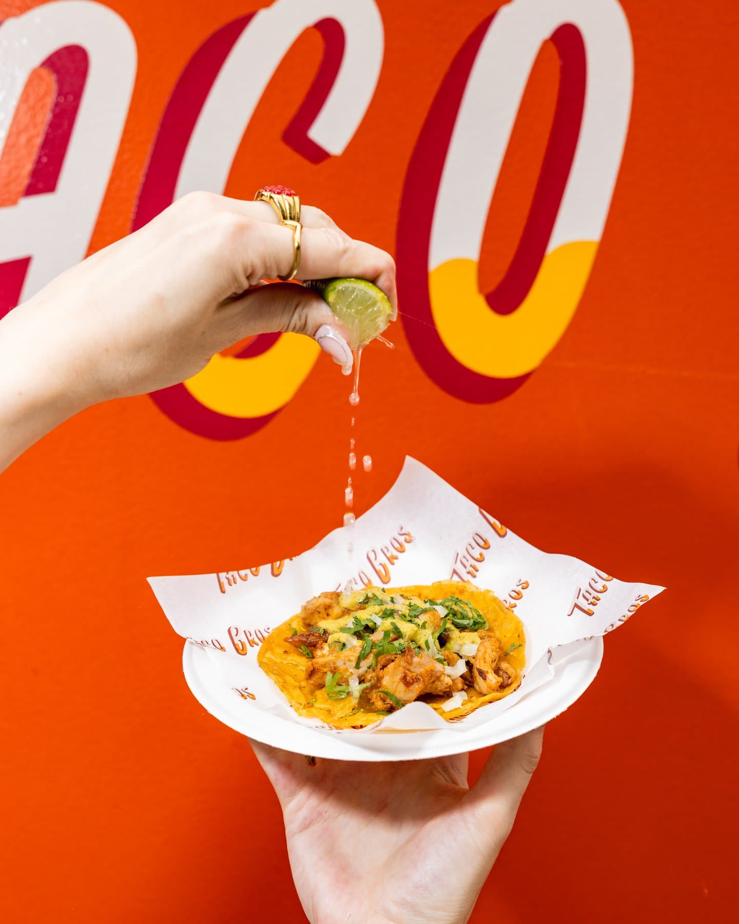 Squeezing lime over a taco