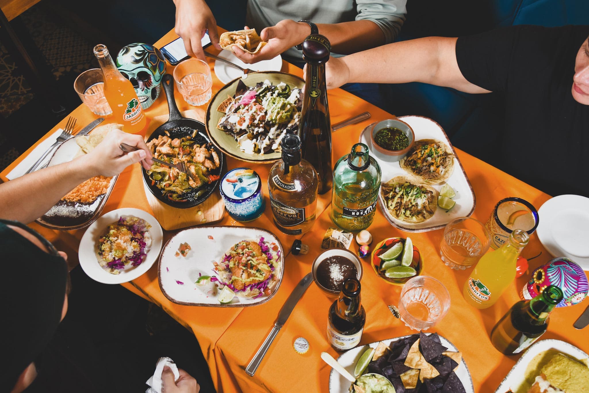 Overhead view of tacos and drinks at Taco Bros